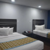 Отель Travelers Inn & Suites, фото 21