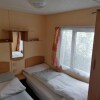 Отель Delightful 3-bed Caravan With Fireplace, Wifi, BBQ, фото 5