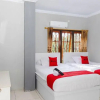 Отель RedDoorz Plus Near Transmart Kairagi Dua Manado, фото 16
