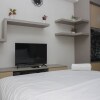 Отель Cozy and Comfort Living Studio at Transpark Cibubur Apartment, фото 2