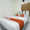 Отель Penginapan Anggrek Syariah 2 by OYO Rooms, фото 16