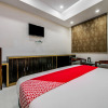 Отель OYO 18542 Petals Inn, фото 12
