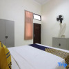 Отель Spot on 93245 Guest House Mulia Dua Syariah, фото 2
