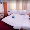 Отель Rent For Comfort Rooms в Бухаресте