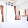 Отель Strategic And Homey Studio At Tamasari Papilio Apartment, фото 4