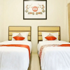 Отель Oyo 1076 Dmc Homestay, фото 3