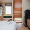 Отель Cozy Living Studio at Springlake Summarecon Bekasi Apartment, фото 3