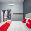 Отель SUPER OYO Gandaria Guest House Near Masjid Raya Sumatera Barat, фото 4