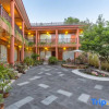 Отель Lijiang Zhuohuayuan Boutique Inn, фото 1