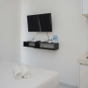 Отель Homey And Minimalist Studio At Sky House Bsd Apartment, фото 3