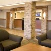 Отель Woodlands Inn & Suites, фото 5