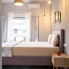 Отель Enjoy Sunsets Fully Equiped 2-bed Apartment Athens, фото 6