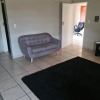 Отель Justin's Place Lounge. An exceptional, large home with no Load Shedding, by The Grove Mall and Wilge, фото 2