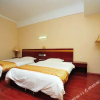 Отель Xishuangbanna Qunyi Business Hotel, фото 1