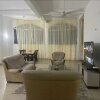 Отель Lux Suites Mkomani Beachfront Apartment в Момбасе