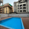 Отель Lovely 3-bed With a Pool Next to Four Point, фото 7