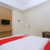 Отель OYO 999 Garuda Guesthouse, фото 5