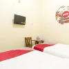 Отель OYO 723 Penginapan Nia Mandiri Syariah, фото 12