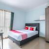 Отель OYO 1551 Studento Guest House, фото 6