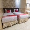 Отель OYO 1702 Harmoni Inn Makassar, фото 4