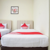 Отель OYO 1241 Eirini Family Homestay, фото 4