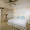 Отель Fairway And Ocean Views - Blue Moon 4 Bedroom Villa by RedAwning, фото 2