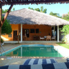 Отель Bungalow With 2 Bedrooms in Andilana, With Wonderful sea View, Shared Pool and Enclosed Garden, фото 7