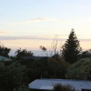 Отель Hampton on Apollo - Ocean Mountain View Creekside Retreat Pet Friendly Free EV Charger Fireplace Woo, фото 1