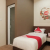 Отель Oyo 620 The Peak Guest House Syariah, фото 8