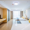 Отель Baiya Light Luxury Holiday Apartment (Yangzhou Railway Station Jinghuacheng Branch), фото 7