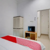 Отель OYO 92861 Raya Guest House Syariah, фото 6