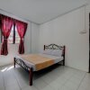 Отель OYO HOME 90800 Rumah Pangi Homestay, фото 7