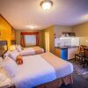 Отель Alpine Inn & Suites, фото 7