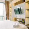 Отель Modern and Cozy Studio at Sky House BSD Apartment, фото 4