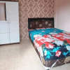 Отель SPOT ON 93880 Guest House Bu Iin Syariah, фото 7