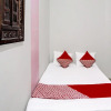 Отель OYO 91784 Zazezo Homestay Syariah, фото 11
