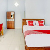 Отель Azka Homestay Syariah by OYO Rooms, фото 25