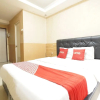 Отель OYO 93547 Metro Suites Apartment By Barbie Homestay, фото 2