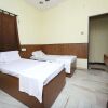 Отель SPOT ON 6856 Eshi Guest House, фото 12