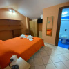 Отель Villa Paradise in recidence a 50 metri dal mare con servizio di piscina a 100 metri PISCINA APERTA, фото 1