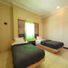 Отель Candi Panggung Family Guest House Syariah, фото 7