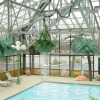 Отель Wildwood Inn Tropical Dome & Theme Suites, фото 10