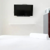 Отель New Homey Studio At Puncak Cbd Apartment, фото 6