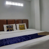 Отель SPOT ON 92822 Finest House Near Amplas Bus Terminal, фото 5