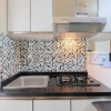 Отель Minimalist and Comfy 2BR at Bassura City Apartment, фото 7