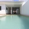 Отель Parede Villa With Pool by Homing в Massamá e Monte Abraão