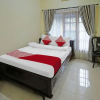 Отель OYO 335 Wisma Empat Lima Syariah, фото 4