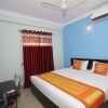 Отель OYO 7480 Garden Green Deluxe 2, фото 4