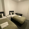 Отель Cosy 3BD Guesthouse. Private Bathrooms, фото 5
