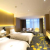 Отель Dongfang Juyi Hotel (Zhengzhou East Railway Station Kailin IFC), фото 1